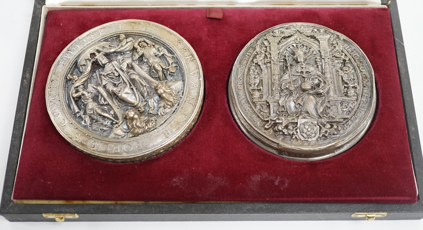 Two 1970's cased limited edition reproduction silver seals, 'The Royal Seal of King Henry VIII of England' and 'The Royal Seal of King Francis I of France', Hennell, Frazer & Haws, London, 1972, 91mm. Condition - fair to